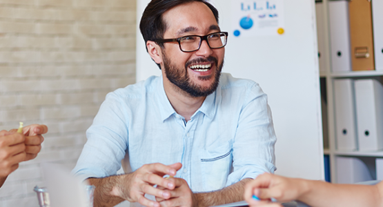 Man speaking in a meeting
