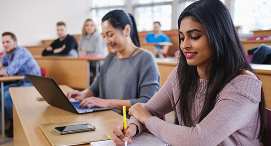 Two students learning in a classroom