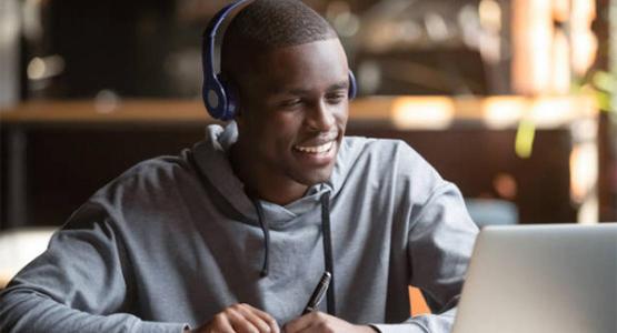 Student learning on laptop