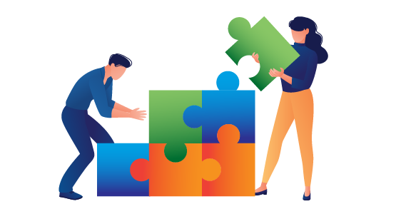Two people building the Paradigm logo out of building blocks