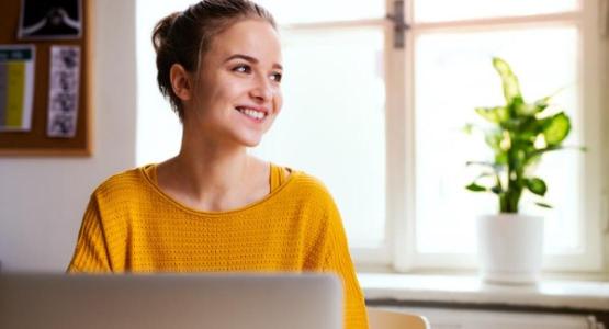 Female Student Using a Laptop